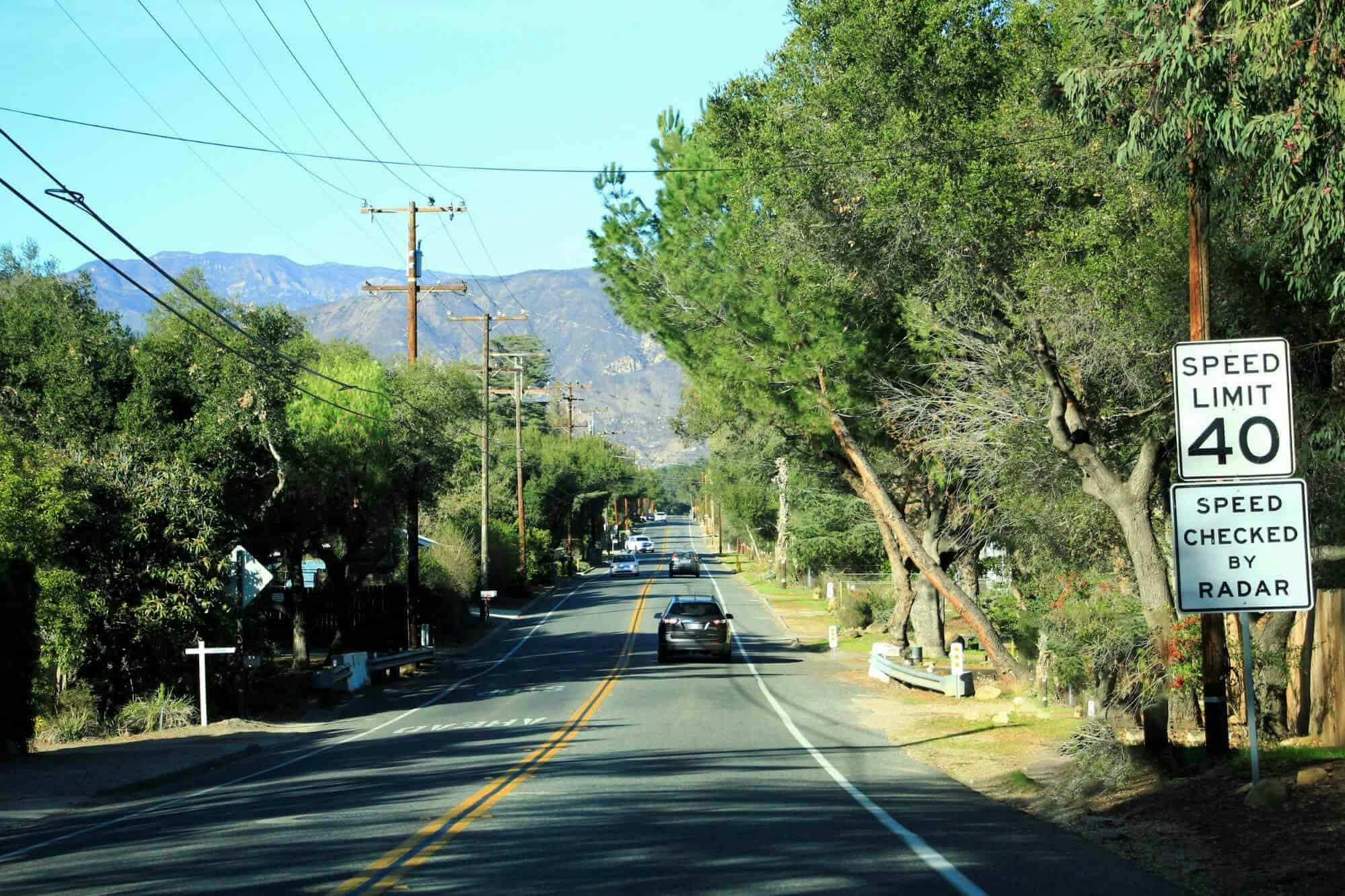 road with speed limit sign