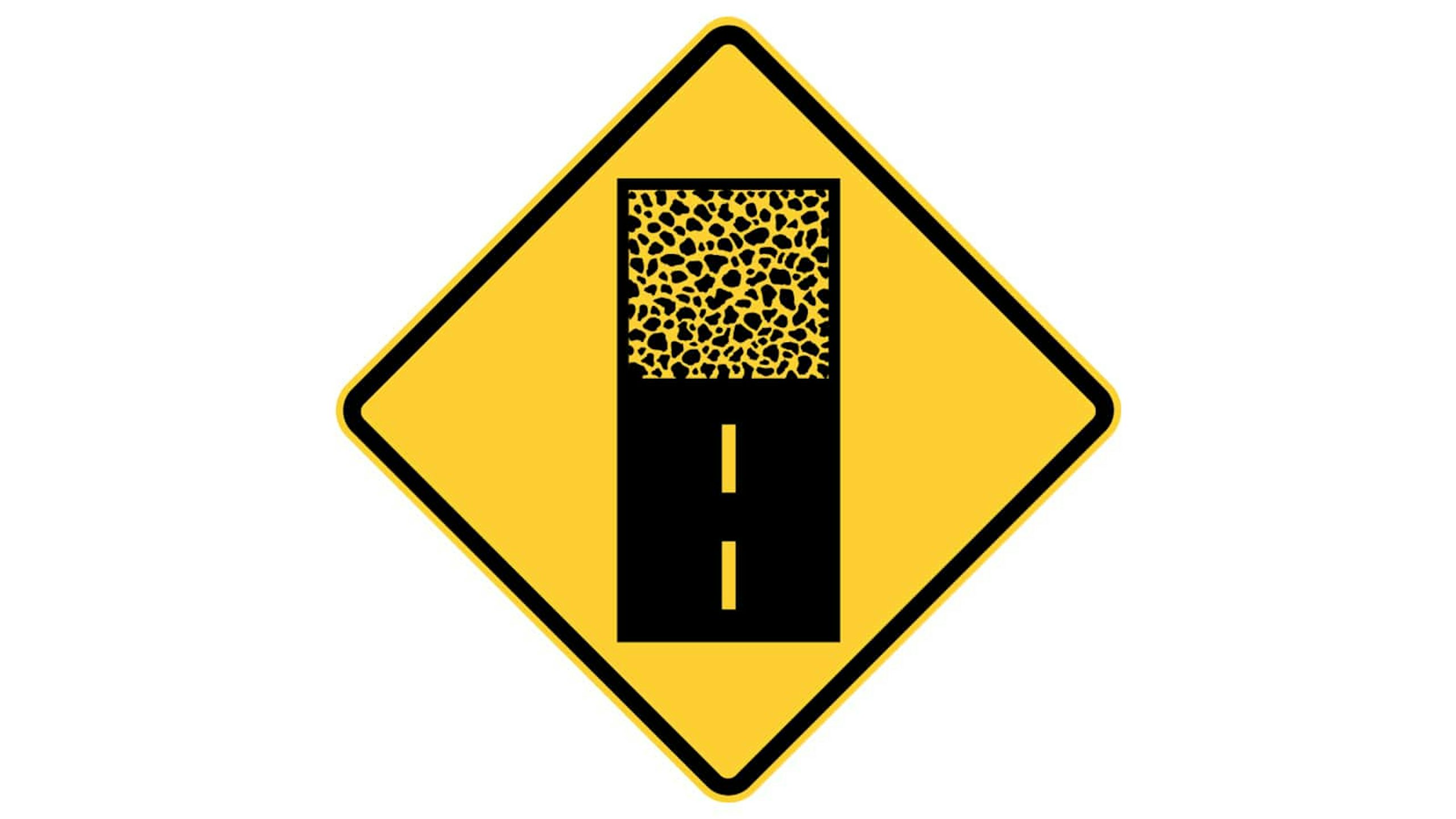 Warning sign Pavement Ends Ahead