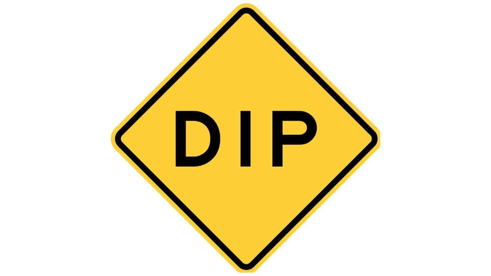 Warning sign Dip Ahead