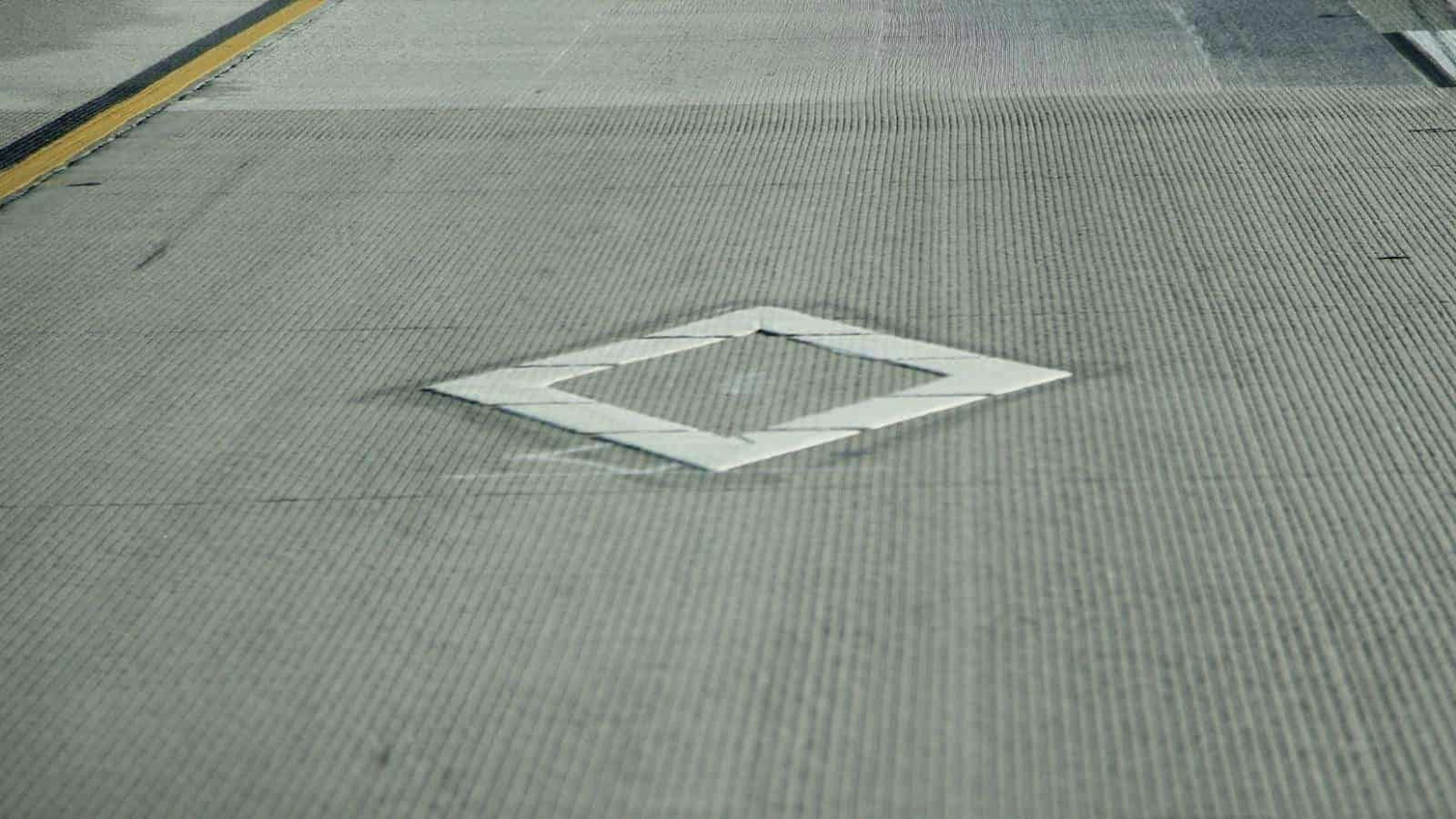HOV lane diamond symbol road marking
