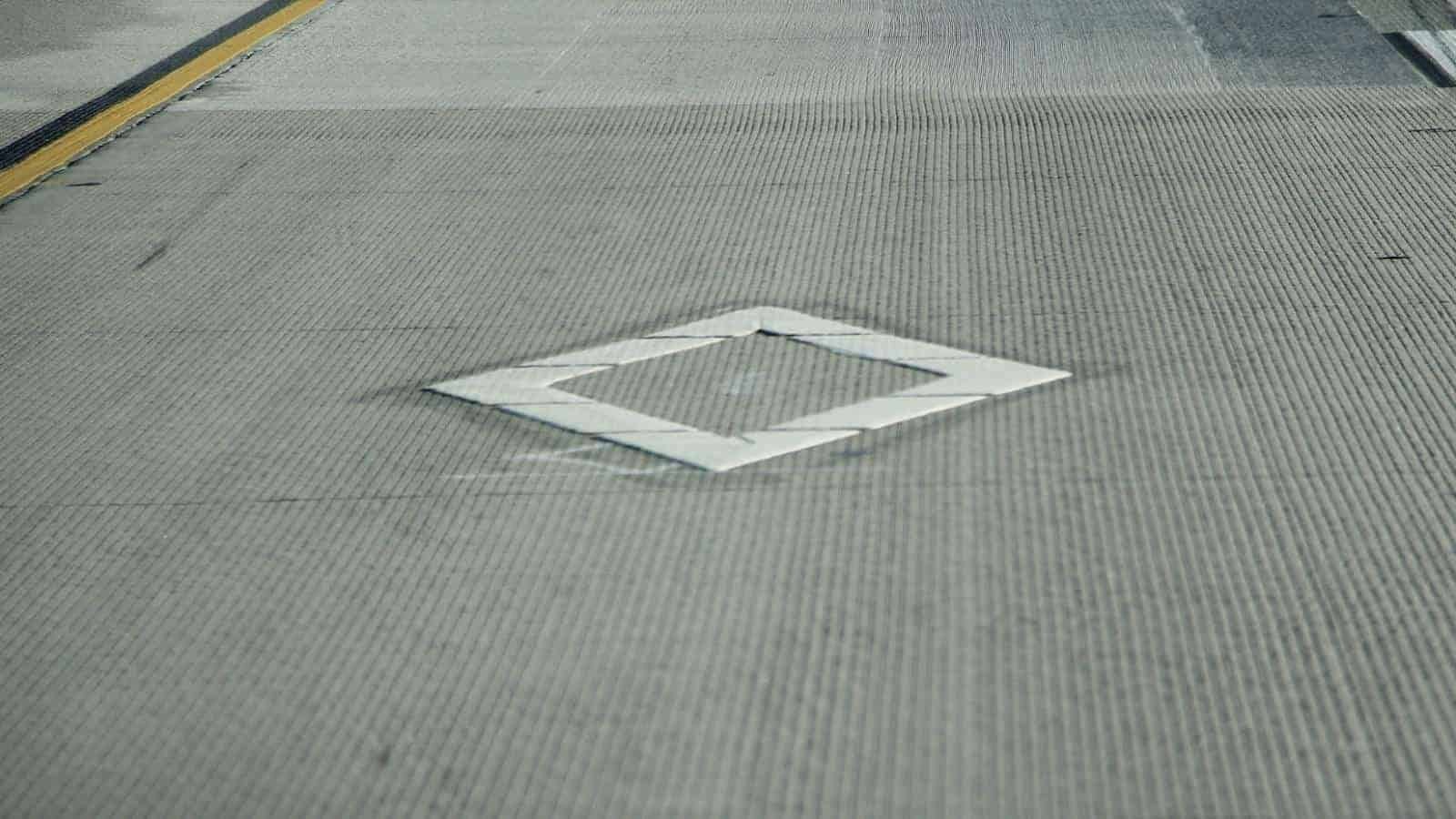 HOV lane diamond symbol road marking