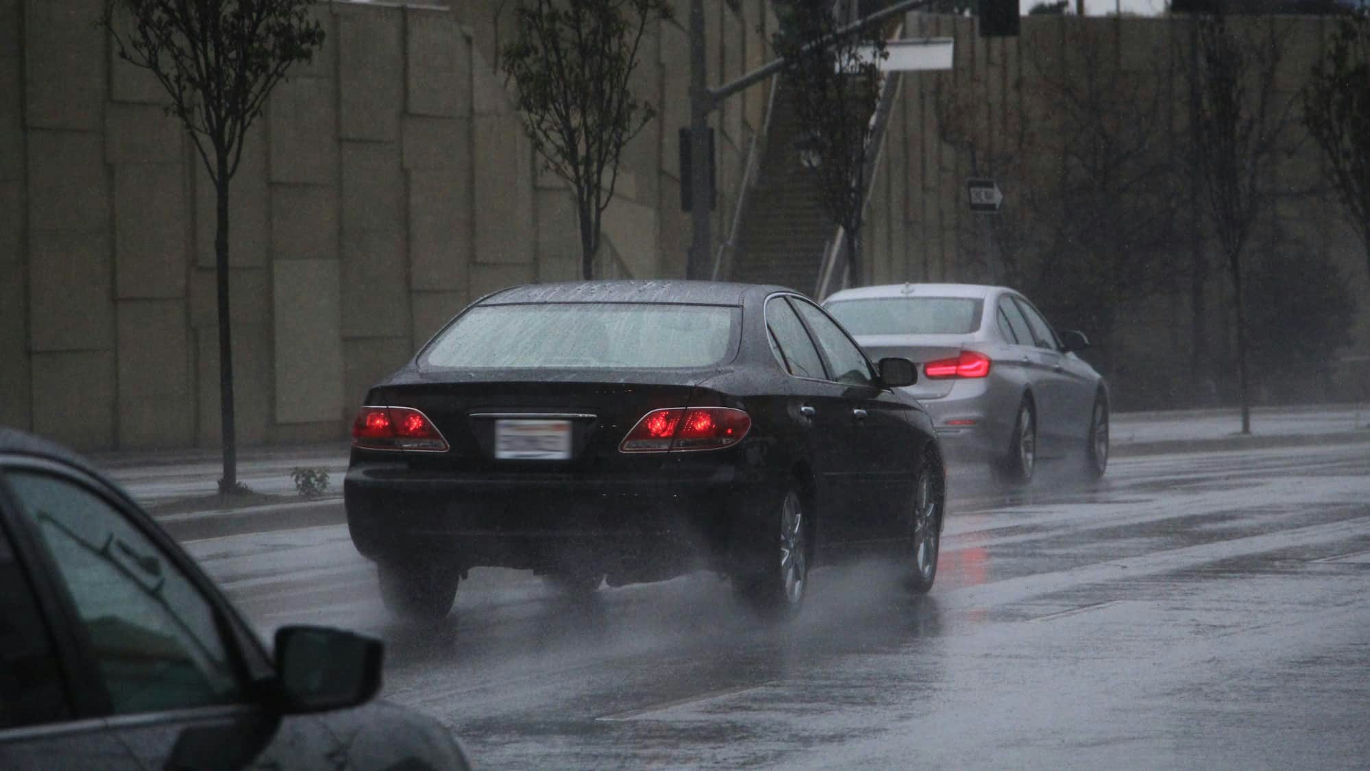 Cars in the rain on the wet road