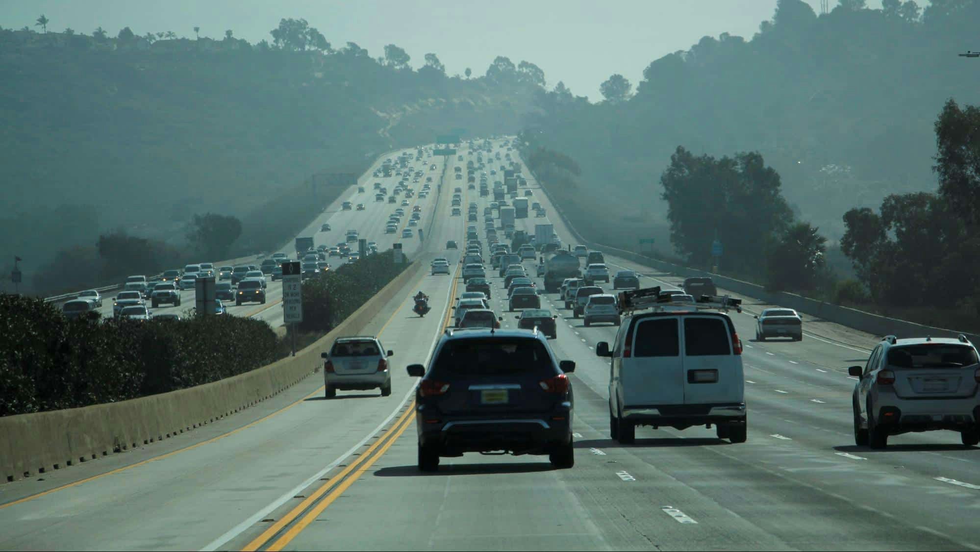 A freeway with heavy traffic 