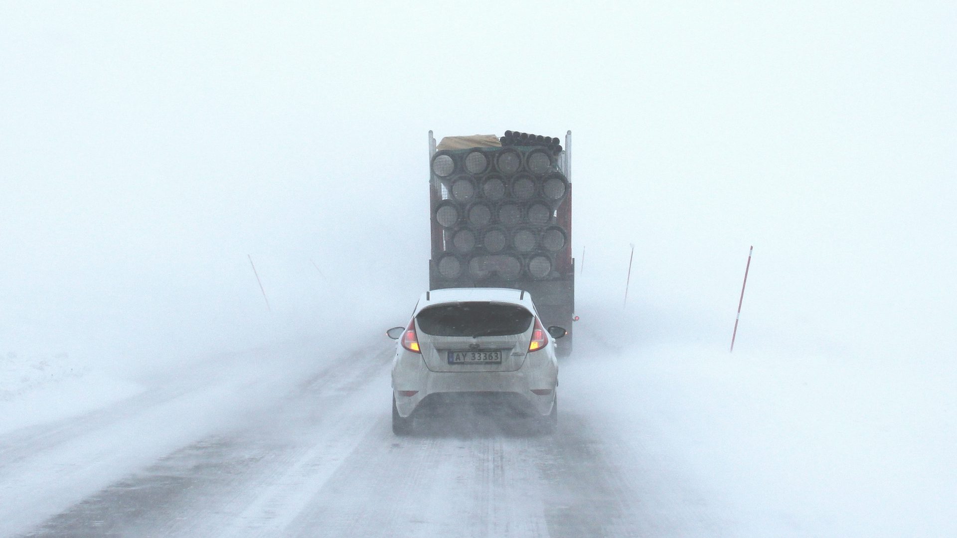 car behind the truck in winter