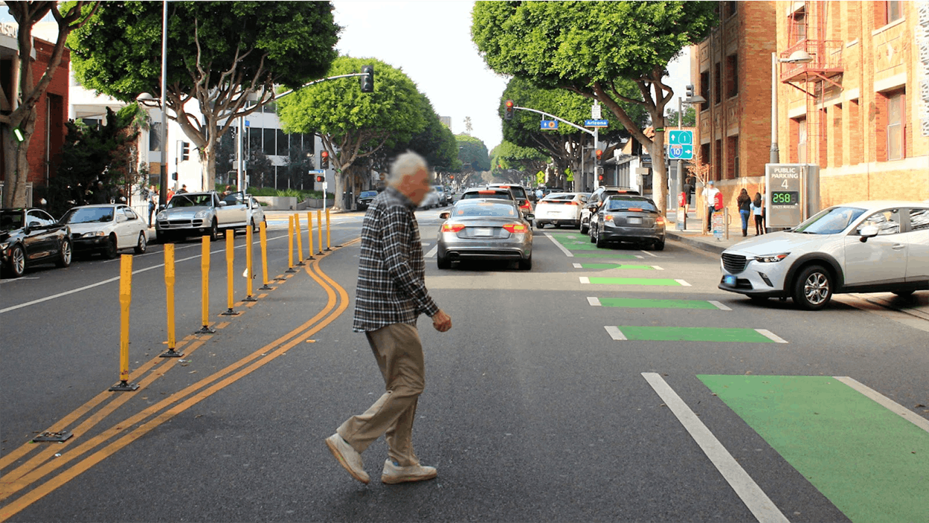 pedestrian crossing the road