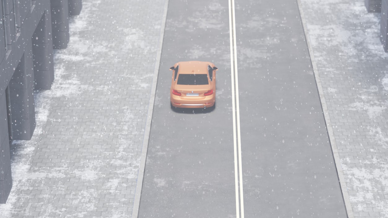 An orange car driving during winter in the UK